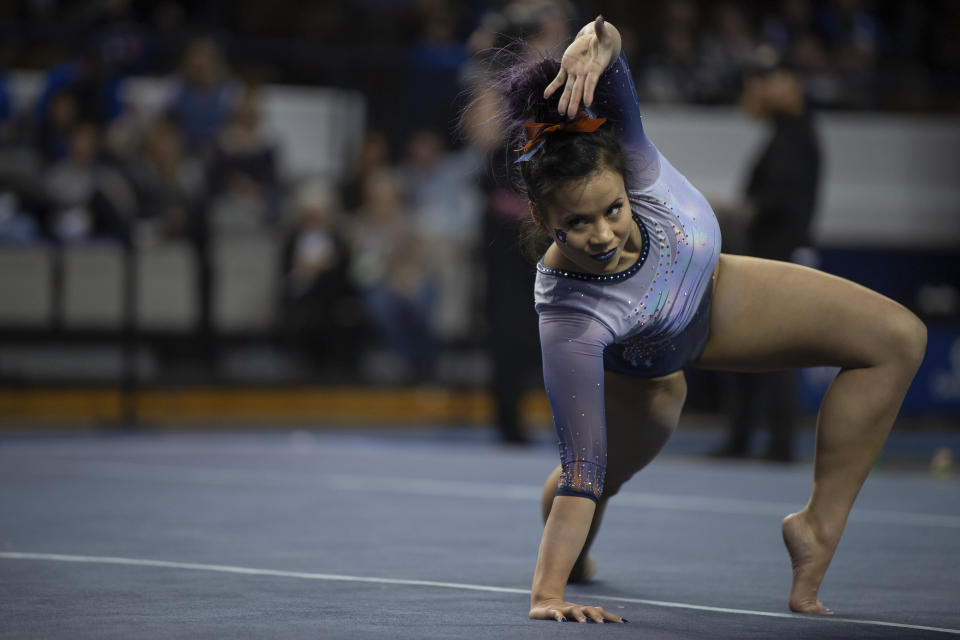 Auburn's Samantha Cerio performs a floor routine during an NCAA gymnastics meet against Kentucky, Friday, Feb. 1, 2019, in Lexington, KY. (AP Photo/Bryan Woolston)