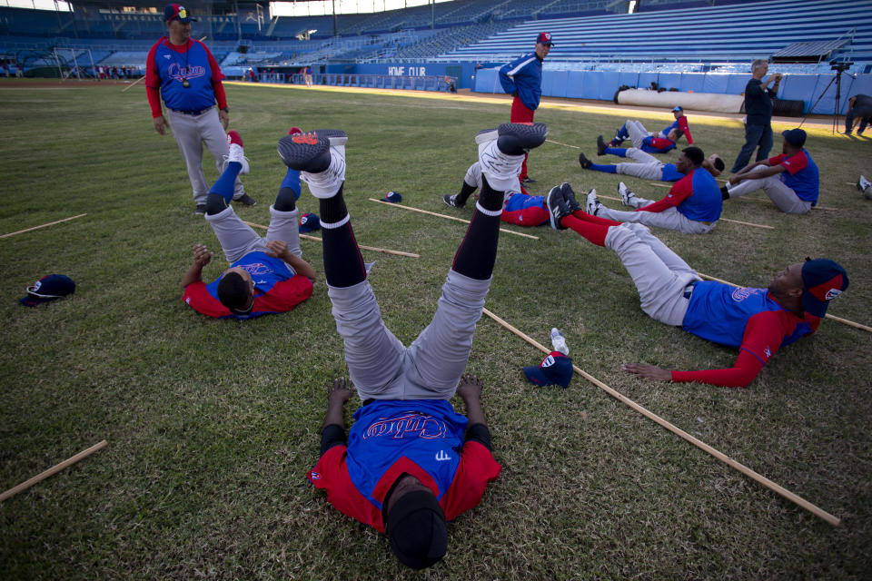 Cuban national baseball team hopefuls begin training at Latinoamericano stadium as they prepare for the 2023 World Baseball Classic, in Havana, Cuba, Monday, Jan. 16, 2023. ( AP Photo/Ismael Francisco)