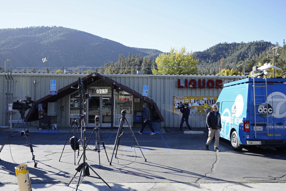 Media gather outside the Midway Market & Liquor store where a winning lottery ticket was sold in Frazier Park, Calif., Thursday, Oct. 12, 2023. A player in California won a $1.765 billion Powerball jackpot Wednesday night, ending a long stretch without a winner of the top prize. (AP Photo/Marcio Jose Sanchez)