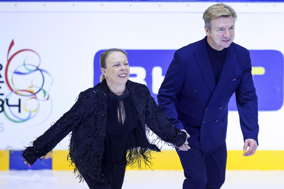 British ice dancers Jayne Torvill and Christopher Dean perform the routine which gave them the first, and so far only, perfect score in Olympic skating history, Bolero, during an ice skating show, in Sarajevo, Bosnia, Wednesday, Feb. 14, 2024. The pair received a warm welcome as they returned to Sarajevo to mark the 40th anniversary of their gold medal-winning Winter Olympic performance. (AP Photo/Armin Durgut)