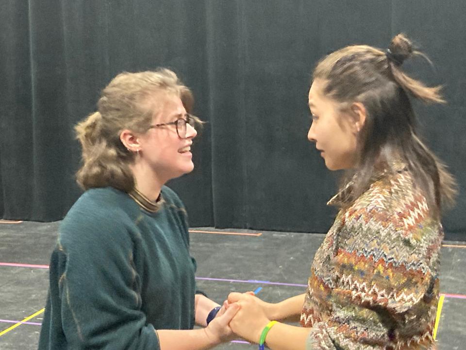 Megan Rose, left, cast as Emma, and Athena Chi Mosenthal, portraying Alyssa, rehearse a scene Nov. 1, 2023 in South Burlington for Lyric Theatre's production of "The Prom."