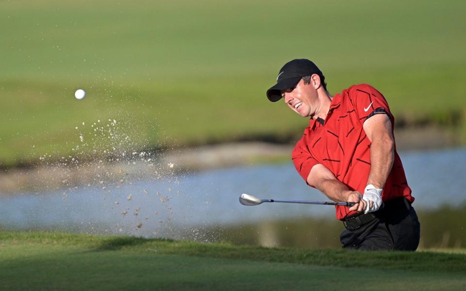 Rory McIlroy, of Northern Ireland, chips onto the 17th green during the final round of the Workday Championship golf tournament on Sunday - AP