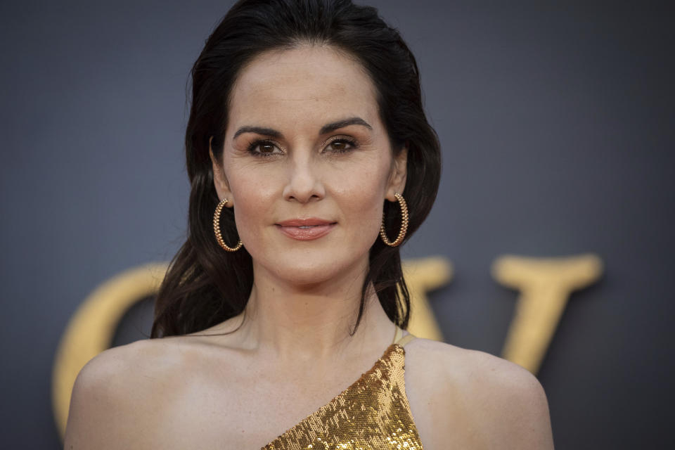 Actress Michelle Dockery poses for photographers upon arrival at the world premiere of the film 'Downton Abbey' in London, Monday, Sept. 9, 2019. (Photo by Vianney Le Caer/Invision/AP)