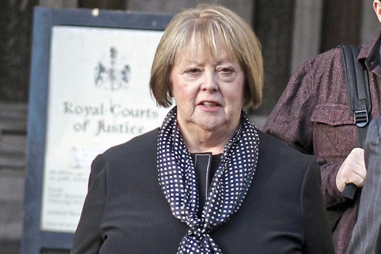 Exonerated: Carole Peters outside Central London county court. The judge found she had not been drinking before she fell down stairs: Champion News