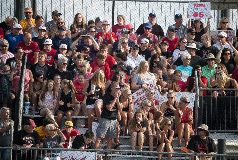 A group of mostly Indiana fans look for small victories during their team's 0-13 loss to the Michigan squad in the regional final, Grand Park, Westfield, Saturday, Aug. 11, 2018. The Grosse Pointe squad will represent the Great Lakes region in the upcoming Little League World Series. 