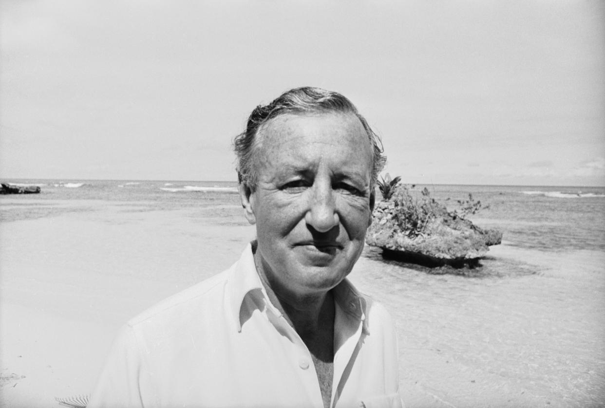 British novelist Ian Fleming on the beach near Goldeneye, his Jamaica home