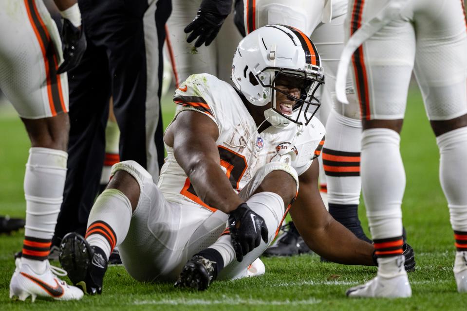 Cleveland Browns running back Nick Chubb (24) sits on the ground after being injured during an NFL football game, Monday, Sept. 18, 2023, in Pittsburgh. (AP Photo/Matt Durisko)