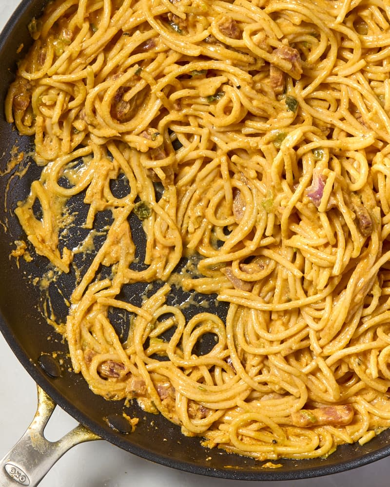 overhead shot of gochujang carbonara in a pan, with some missing.