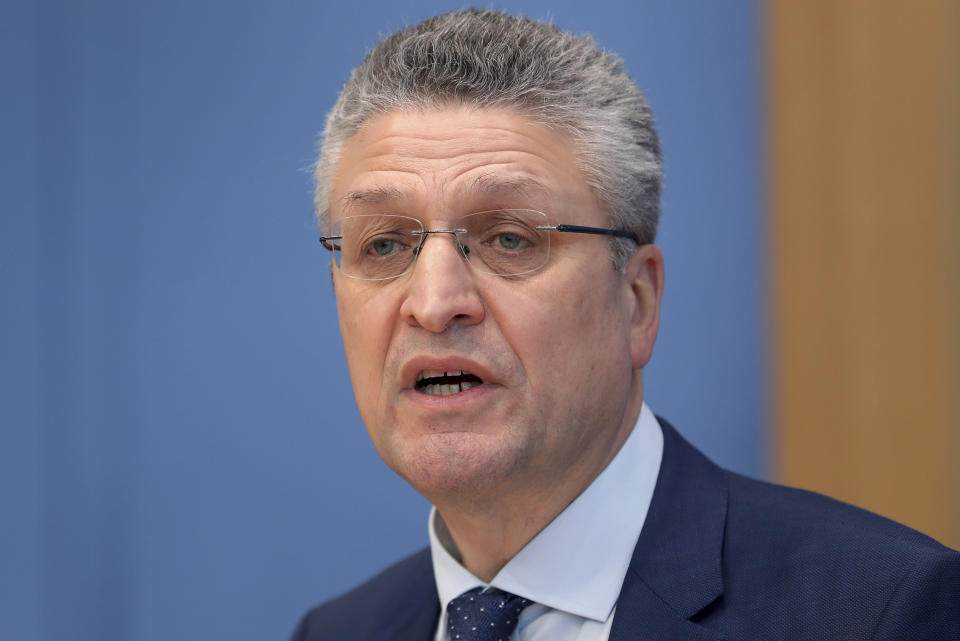 The head of the Robert Koch Institute, German national agency and research institute, responsible for disease control and prevention, Lothar Wieler, addresses the media during a press conference in Berlin, Germany, Wednesday, Dec. 30, 2020 on the new coronavirus, COVID-19, situation and the vaccination campaign in Germany. German authorities have reported more than 1,000 coronavirus-related deaths in one day for the first time since the pandemic began. The national disease control center, the Robert Koch Institute, said Wednesday that 1,129 more deaths were reported over the past 24 hours. (AP Photo/Michael Sohn, pool)