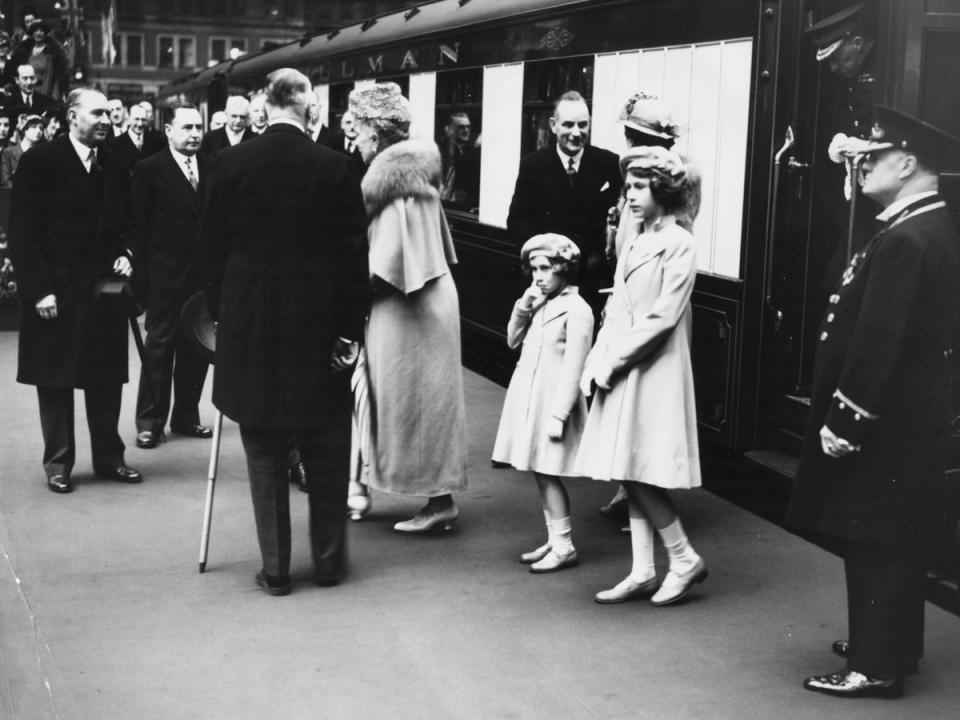 Queen Elizabeth II: Elizabeth and her sister arrive at Waterloo station to say goodbye to their parents as they leave to tour Canada. Elizabeth was thought too young to escort her parents on the tour and was described as 