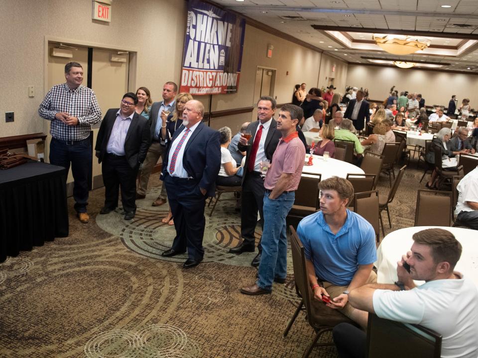 Guests at the GOP election party watch for election results at the Crowne Plaza in Knoxville on Aug. 4, 2022.