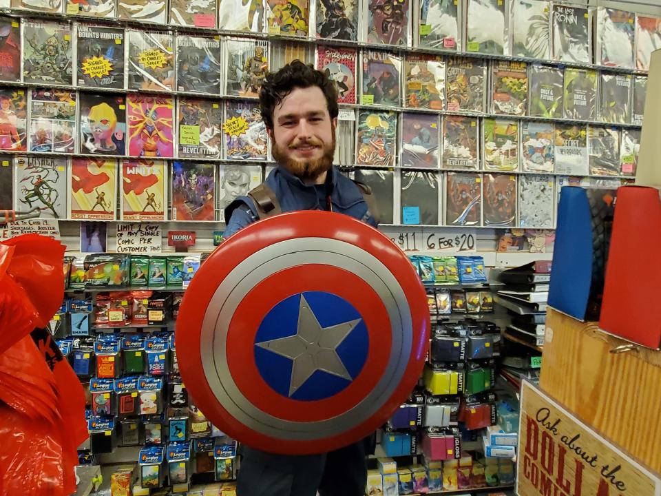 Captain America Jordan White was found manning the register at Jetpack Comics in Rochester for Free Comic Book Day last year. Free Comic Book Day will take place this Saturday, May 7 in Rochester beginning at 10 a.m.