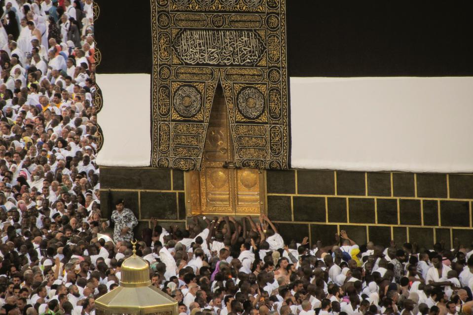 Muslim pilgrims circumambulate around the Kaaba, the cubic building at the Grand Mosque, during the annual hajj pilgrimage in Mecca, Saudi Arabia, Monday, June 26, 2023.