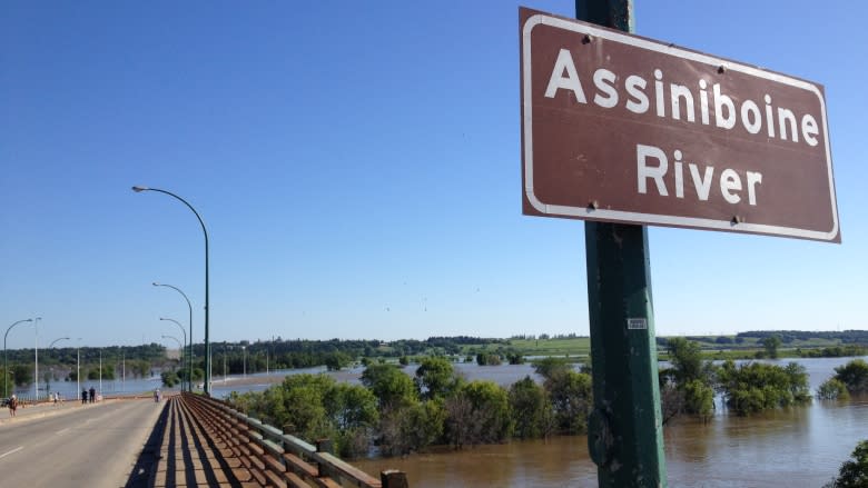 Although they are still holding strong, rain from Saturday softened dikes along the Assiniboine River near Brandon, which could crest anytime.