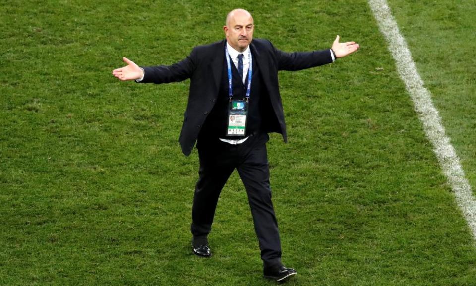 Stanislav Cherchesov celebrates after winning the shootout.