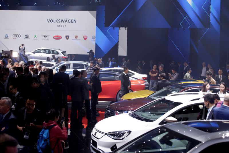FILE PHOTO: New cars are displayed at a Volkswagen event in Beijing