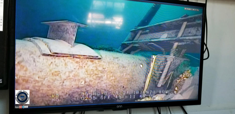 This June 2020 photo, shot from a television screen provided by the Michigan Department of Environment, Great Lakes, and Energy shows damage to anchor support EP-17-1 on the east leg of the Enbridge Line 5 pipeline within the Straits of Mackinac in Michigan. Enbridge who provided the photos to the state of Michigan, last week said an anchor support on the east leg of the pipeline, right, had shifted. A Michigan regulatory panel refused Tuesday, June 30, 2020, to grant quick permission to run a new oil pipeline beneath a channel that connects two of the Great Lakes, deciding instead to conduct a full review. Enbridge filed an application in April with the Michigan Public Service Commission to relocate a segment of its Line 5 that extends beneath the Straits of Mackinac, which links Lakes Huron and Michigan. (Michigan Department of Environment, Great Lakes, and Energy via AP)