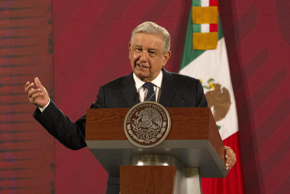 Mexican President Andres Manuel Lopez Obrador gives his daily, morning news conference at the presidential palace, Palacio Nacional, in Mexico City, Friday, Oct. 16, 2020. López Obrador said Friday that his ambassador to the United States told him two weeks ago that there was an investigation underway there involving Mexico's former defense secretary, retired Gen. Salvador Cienfuegos, who was arrested Thursday in Los Angeles. (AP Photo/Marco Ugarte)