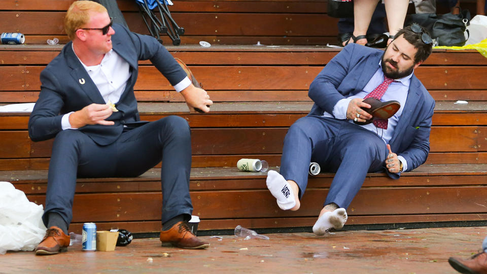 A drunk punter, pictured here at Melbourne Cup day in 2018.