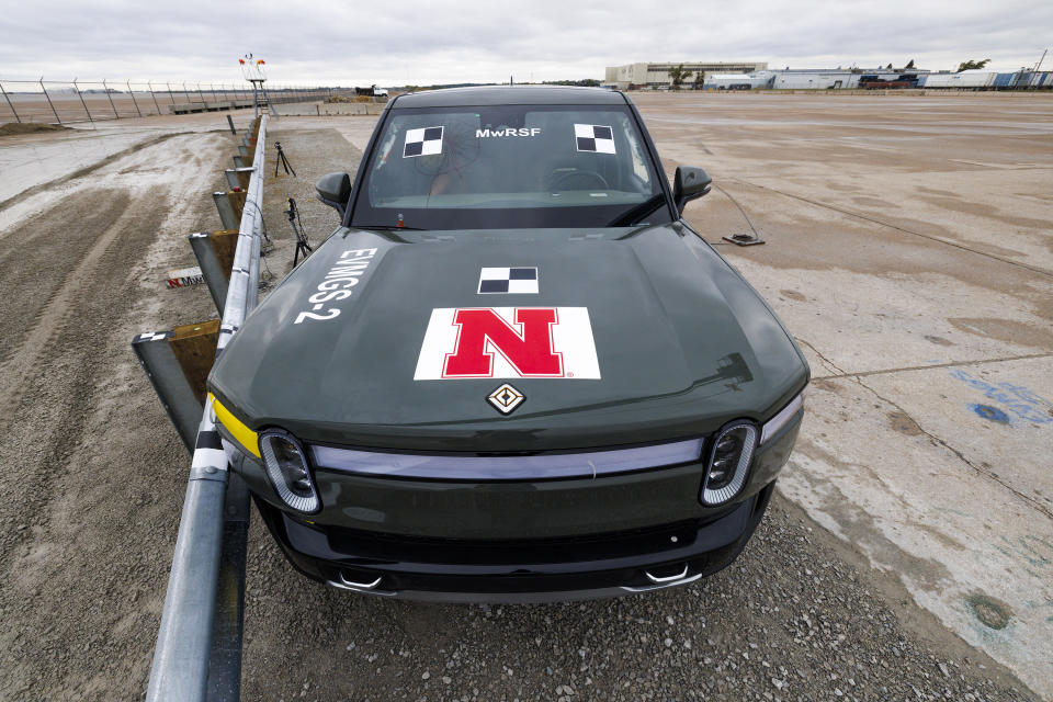 A 2022 Rivian R1T is used for a crash test research by the U.S. Army Corps of Engineers and Development Center and the University of Nebraska-Lincoln's Midwest Roadside Safety Facility on Oct. 12, 2023 in Lincoln, Neb. Preliminary tests point to concerns that the nation’s roadside guardrails are no match for new heavy electric vehicles. (Craig Chandler/University of Nebraska via AP)