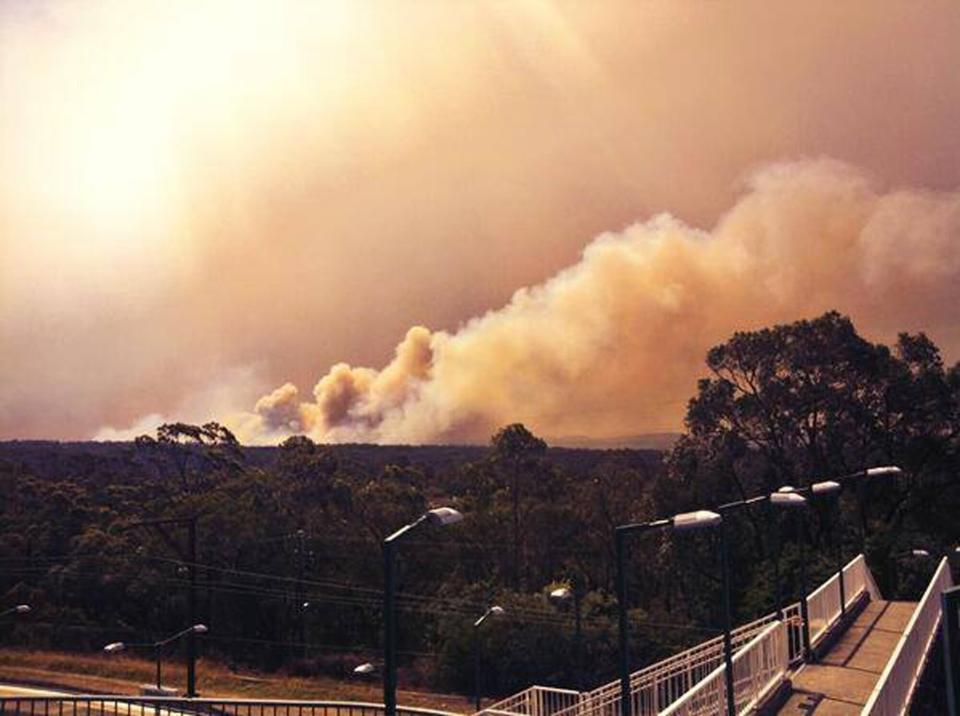 In this photo provided by the New South Wales Rural Fire Service, smoke rises from a fire near Springwood, west of Sydney, Thursday, Oct. 17, 2013. (AP Photo/New South Wales Rural Fire Service)