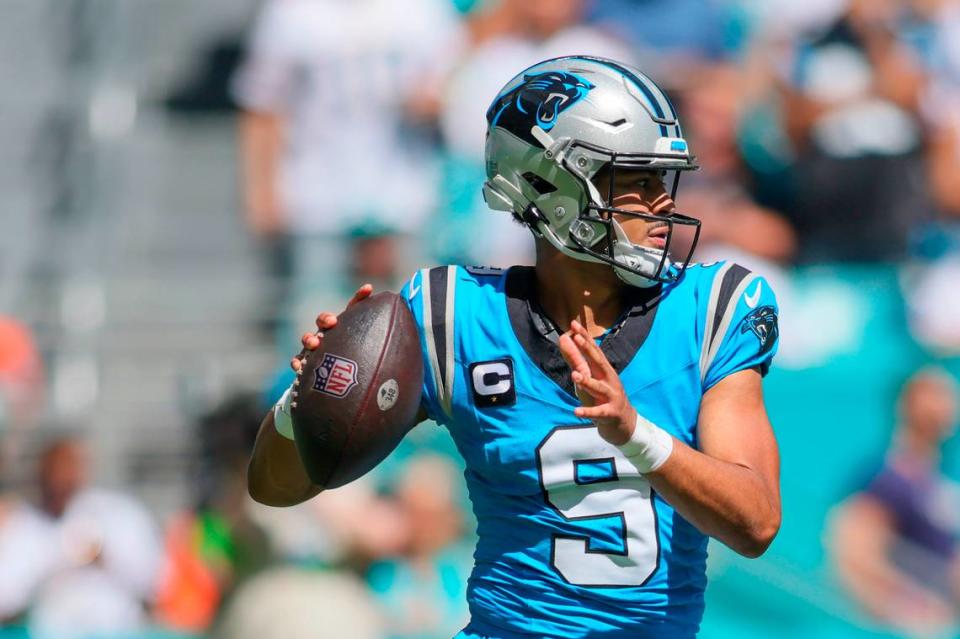 Carolina Panthers quarterback Bryce Young looks for a passing option against the Miami Dolphins during Sunday’s first quarter at Hard Rock Stadium.