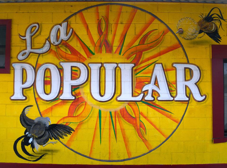 One of the murals at the original La Popular location on Pine Street. The property has been seized for non-payment of taxes, the notice posted Friday.