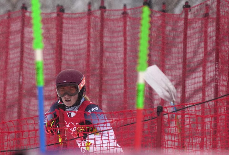 Mikaela Shiffrin by the downhill course at the 2022 Olympics.