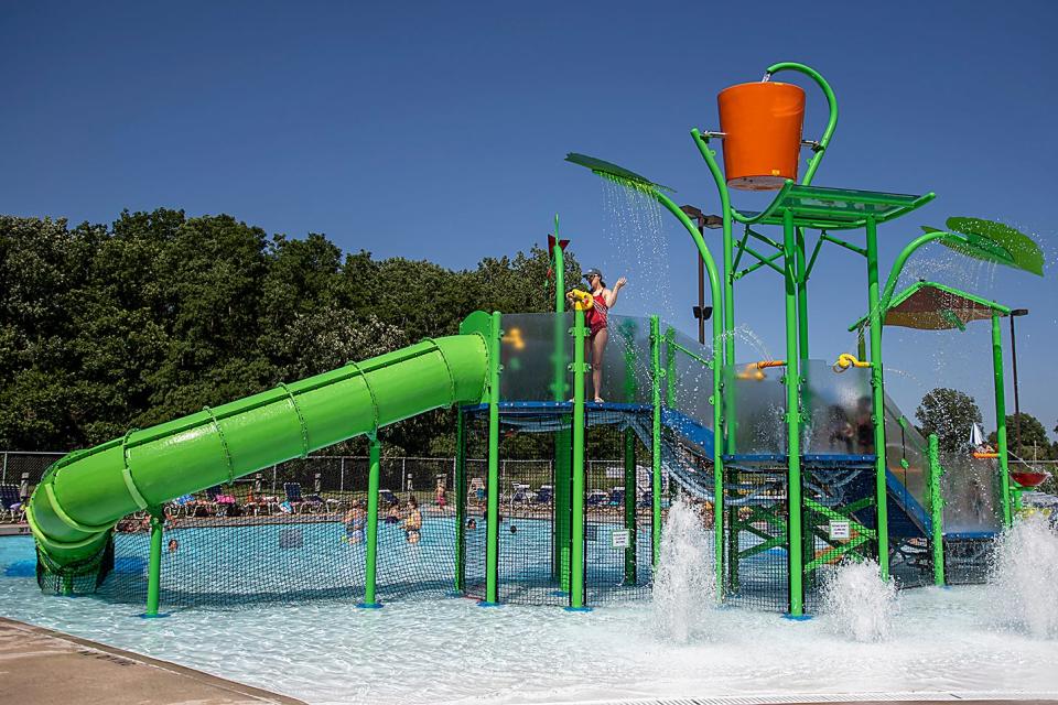 Kids cool off in the new water attraction at Lakeside Water Park, 1033 S. Lake Storey Rd., on Thursday, June 16, 2022.