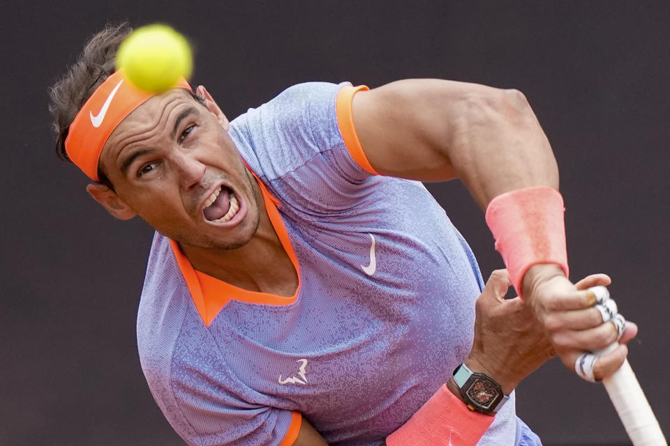 Spain's Rafael Nadal serves the ball to Belgium's Zizou Bergs at the Italian Open tennis tournament, in Rome, Thursday, May 9, 2024. (AP Photo/Andrew Medichini)