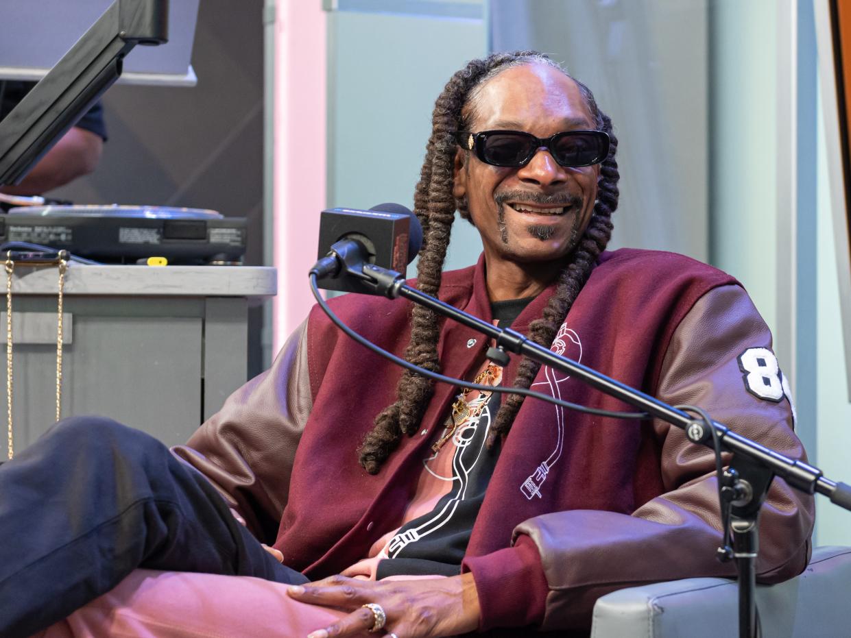 Snoop Dogg sits down with Roxanne Shante on SiriusXM's Rock The Bells Radio at The SiriusXM Studios on October 26, 2021 in New York City.