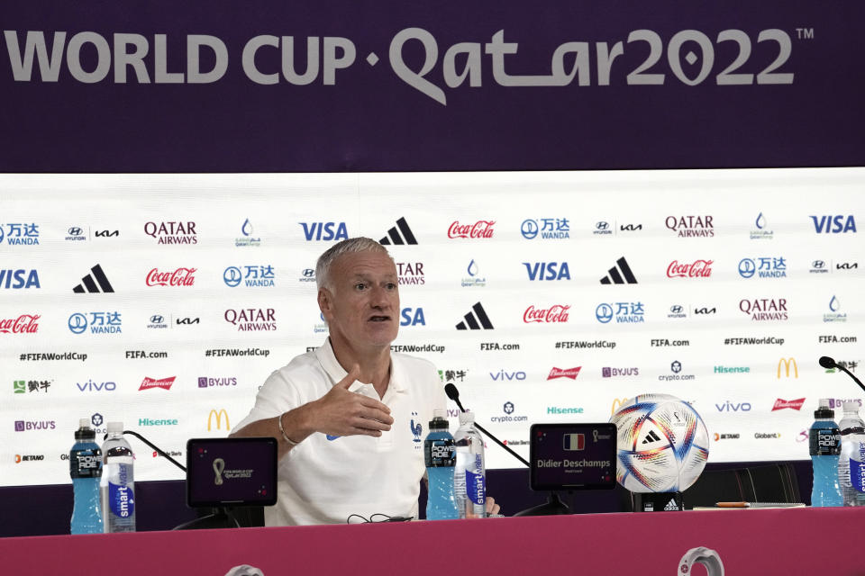 France's head coach Didier Deschamps speaks during a press conference in Doha, Qatar, Tuesday, Nov. 29, 2022, on the eve of the group D World Cup soccer match between Tunisia and France. (AP Photo/Christophe Ena)