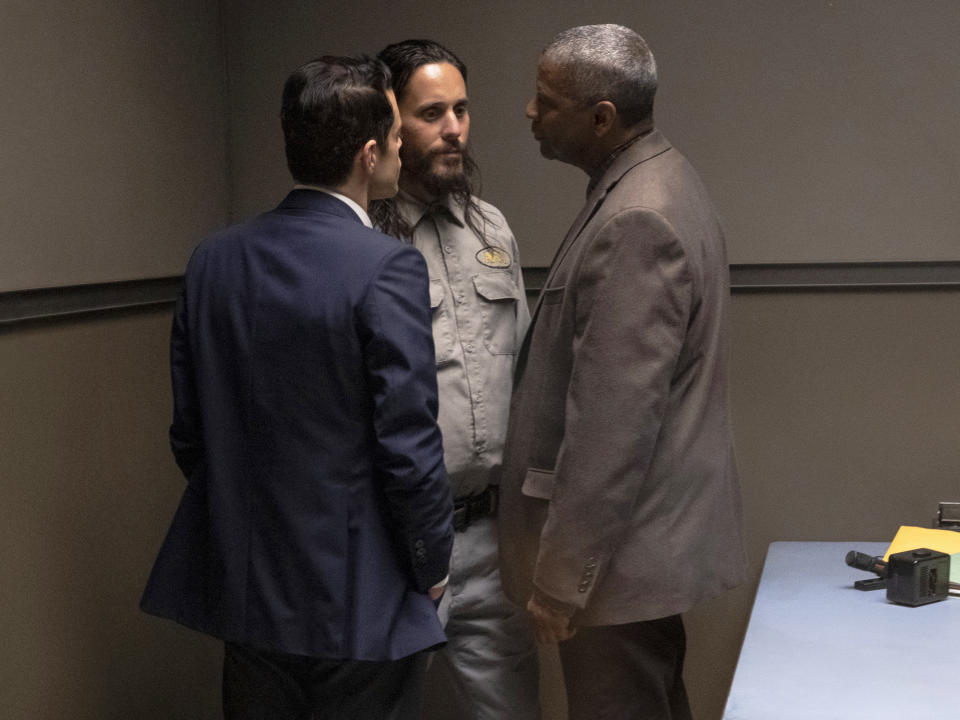 This image released by Warner Bros. Pictures shows Rami Malek, from left, Jared Leto and Denzel Washington in a scene from "The Little Things." (Nicola Goode/Warner Bros Pictures via AP)