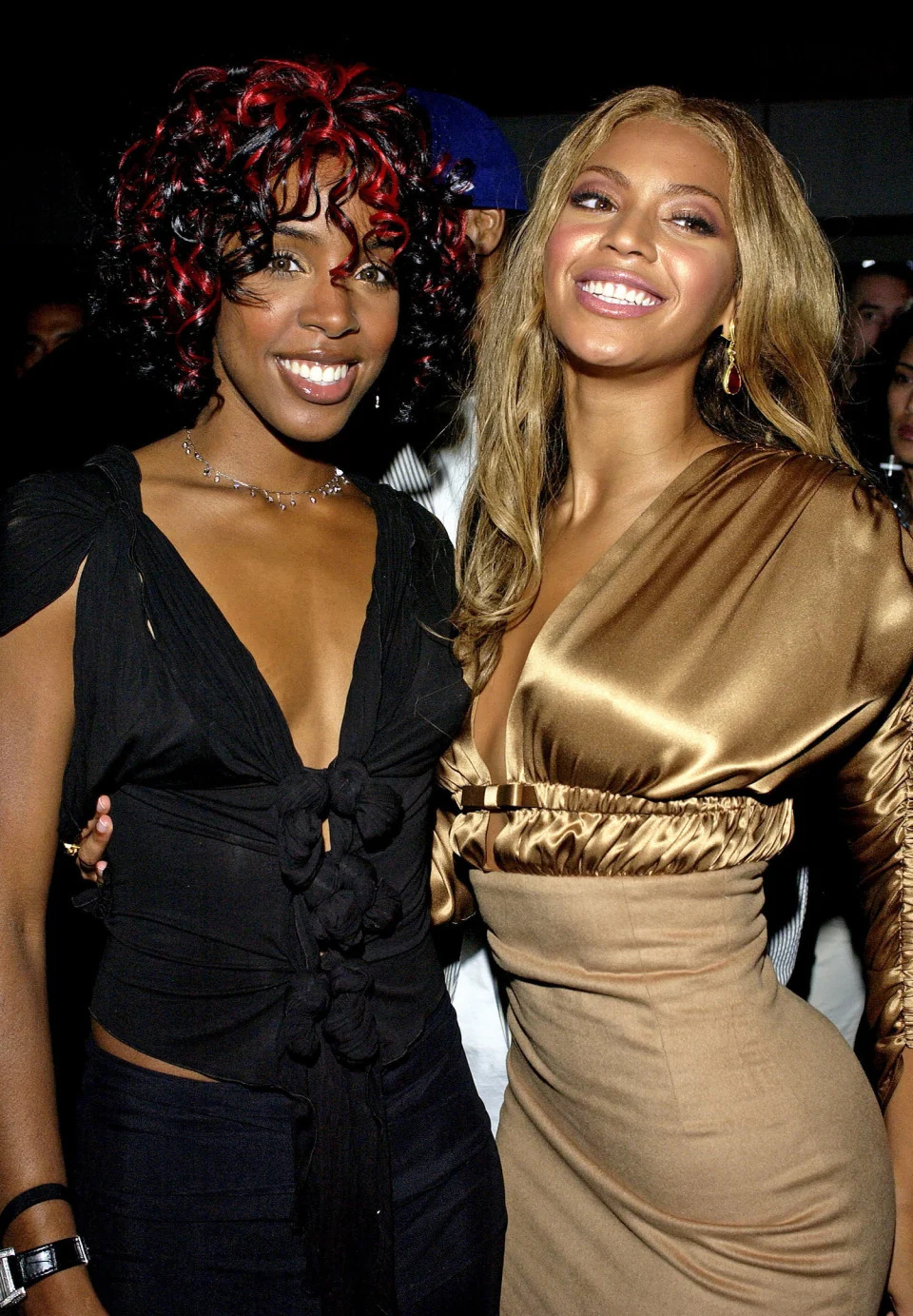 Kelly Rowland and Beyonce Knowles (L. Cohen / WireImage)