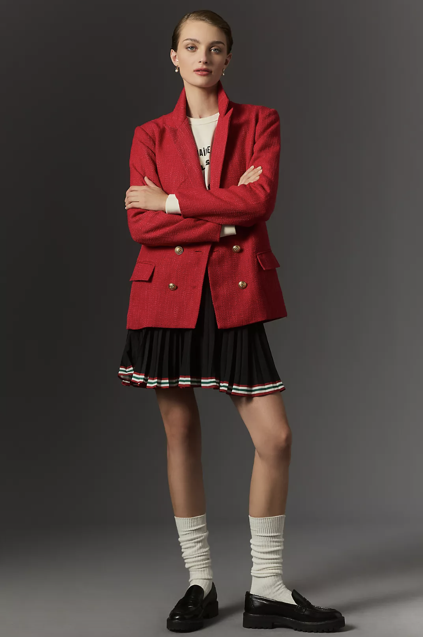 model wearing black loafers, tall white socks, black skirt and red tweed blazer, Bishop + Young Parker Blazer in Raspberry (Photo via Anthropologie)