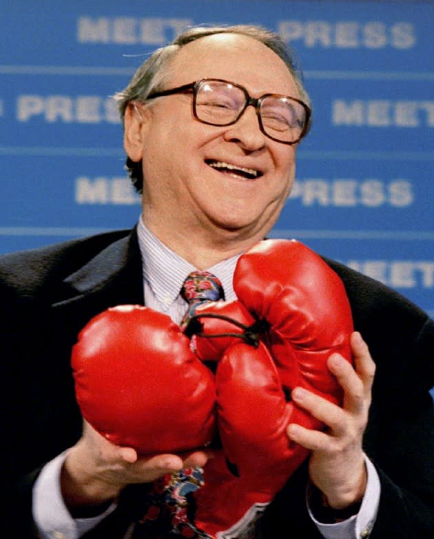 The late <em>NYT</em> columnist William Safire, in 1996. After he wrote a column saying that then-First Lady Hillary Clinton was a “congenital liar,” then-President Bill Clinton said that he would like to punch Safire in the nose. Hilarity ensued when Safire was given a set of boxing gloves when he appeared on <em>Meet the Press</em>. (Ho New / Reuters)