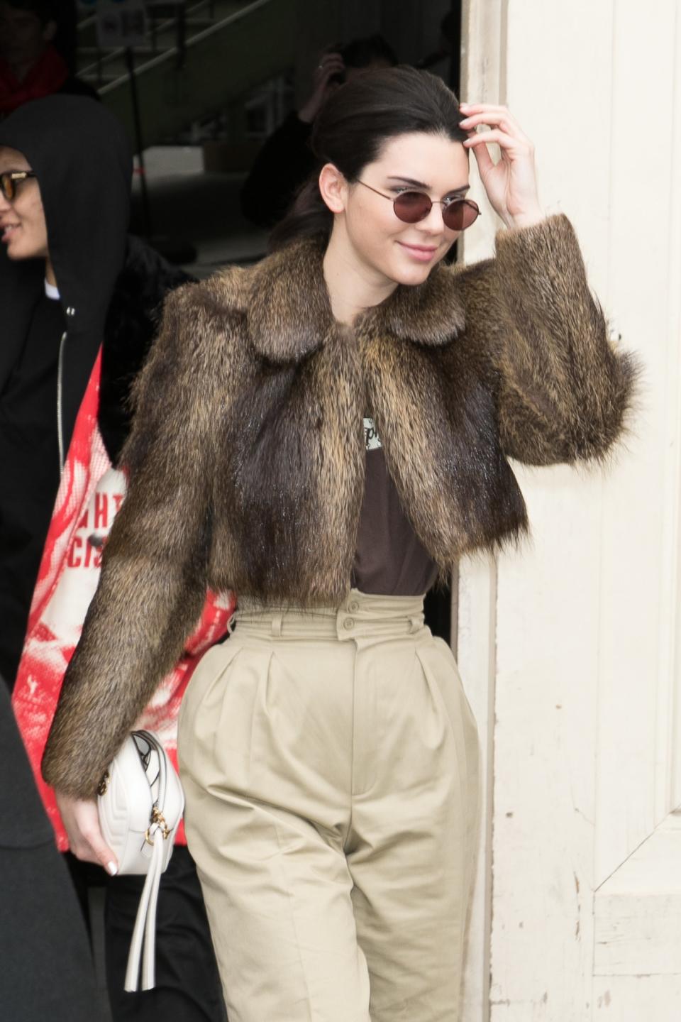 On a recent outing in Los Angeles, Kendall Jenner stepped out wearing a pair of yellow paper-bag waist pants.