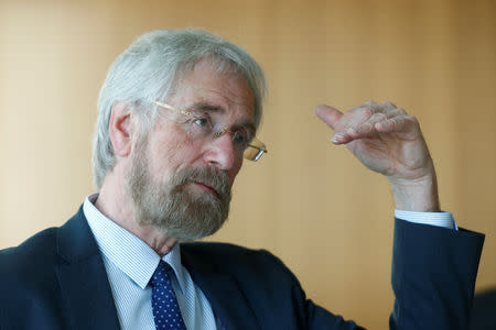 FILE PHOTO: European Central Bank (ECB) executive board member Peter Praet speaks during an interview with Reuters in Frankfurt, Germany, March 14, 2018. REUTERS/Ralph Orlowski