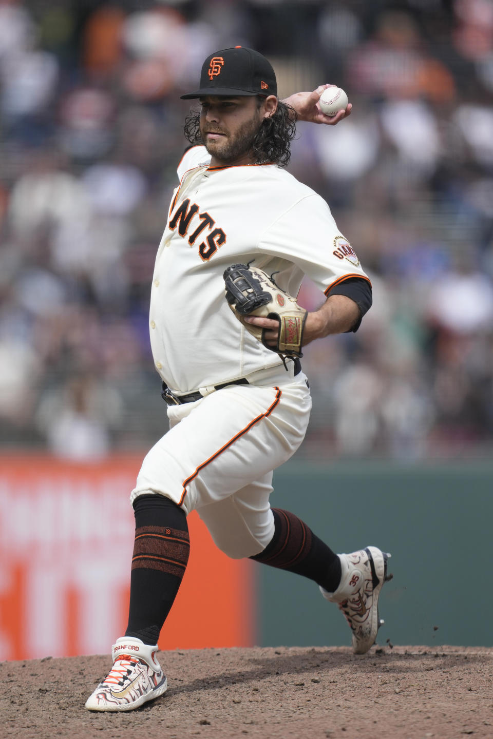 San Francisco Giants position player Brandon Crawford pitches during the ninth inning of a baseball game against the Chicago Cubs in San Francisco, Sunday, June 11, 2023. (AP Photo/Jeff Chiu)