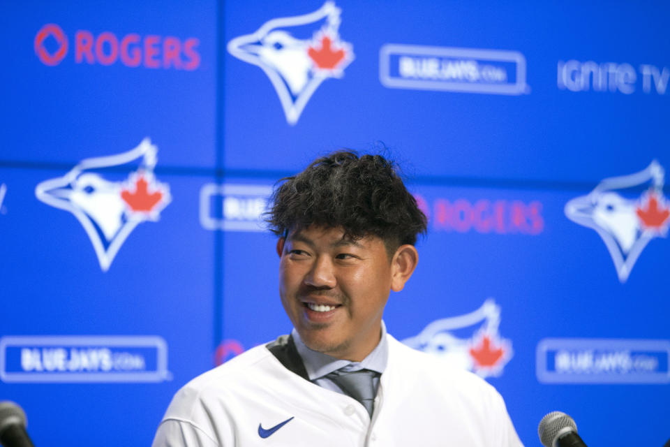 Toronto Blue Jays newly-signed pitcher Shun Yamaguchi speaks to the media, Wednesday Jan. 15, 2020 in Toronto (Chris Young/The Canadian Press via AP)