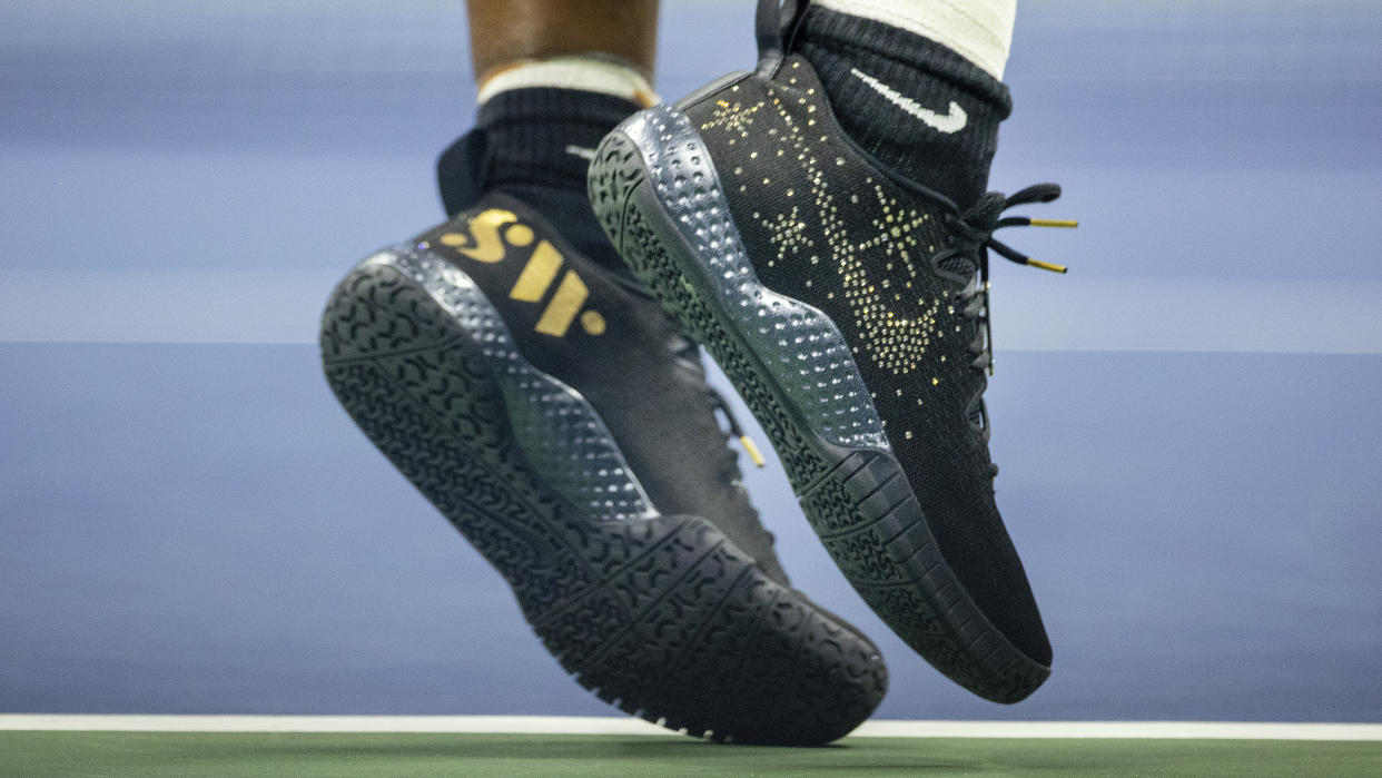 Serena Williams wore diamond-encrusted Nikes for her last Grand Slam. Image via Getty