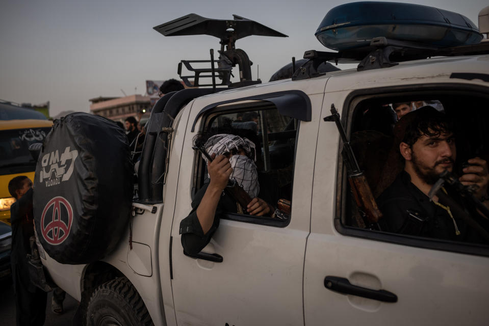 Taliban fighters drive into Kabul on Aug. 15.<span class="copyright">Jim Huylebroek—The New York Times/Redux</span>