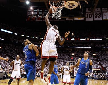 LeBron James' fourth-quarter dunk in front of Tyson Chandler helped close out the Heat's 92-84 victory over the Mavericks in Game 1 of the NBA Finals