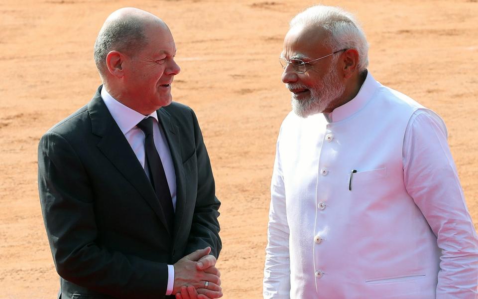 Mandatory Credit: Photo by HARISH TYAGI/EPA-EFE/Shutterstock (13782493ae) German Chancellor Olaf Scholz with Indian Prime Minister Narendra Modi (R) during the ceremonial reception at the Presidential House in New Delhi, India, 25 February 2023. Scholz is on his two days first state visit to India, focused on economic ties, green technology, Indo-Pacific strategy and scheduled to meet top Indian leadership. German Chancellor Olaf Scholz visits India, New Delhi - 25 Feb 2023 - HARISH TYAGI/EPA-EFE/Shutterstock