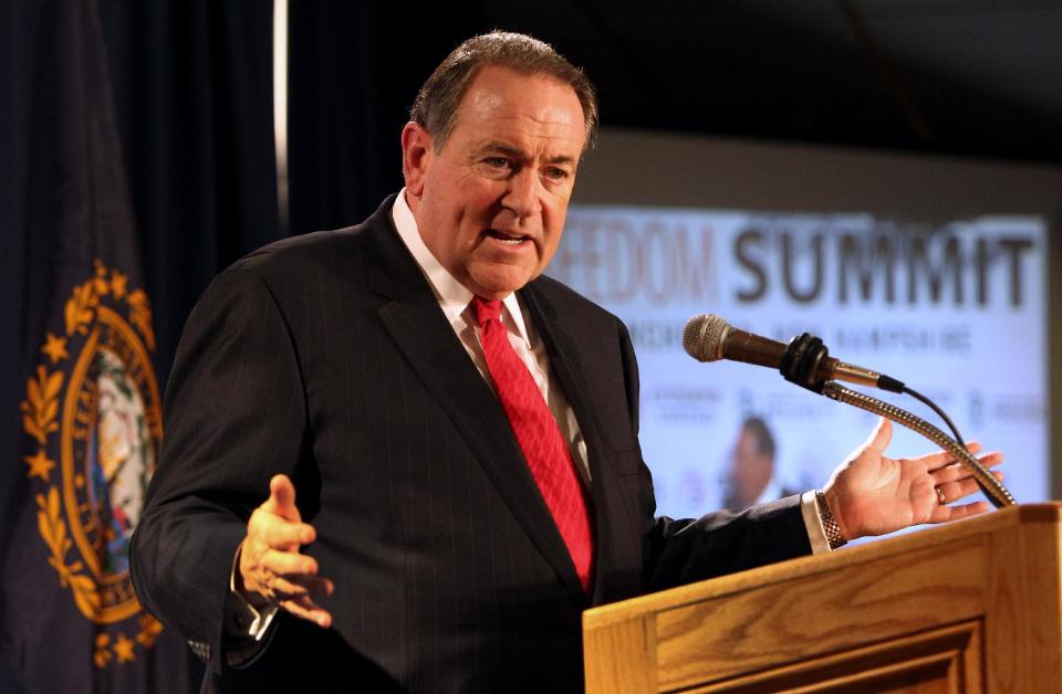 Former Arkansas Gov. and Republican presidential candidate Mike Huckabee speaks at a GOP Freedom Summit, Saturday, April 12, 2014, in Manchester, N.H. Several potential Republican White House contenders _ among them Kentucky Sen. Rand Paul, Cruz, and former Arkansas Gov. Mike Huckabee _ headline a conference Saturday in New Hampshire, hosted by the conservative groups Citizens United and Americans for Prosperity. (AP Photo/Jim Cole)