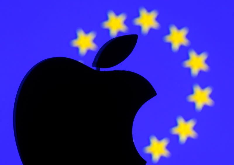FILE PHOTO: A 3D-printed Apple logo is seen in front of a displayed European Union flag in this illustration