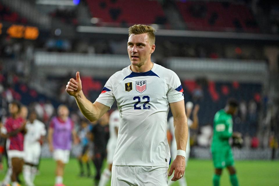 Jun 28, 2023; St. Louis, Missouri, USA; United States forward Julian Gressel (22) salutes the crowd after the United States defeated Saint Kitts and Nevis at CITYPARK. Mandatory Credit: Jeff Curry-USA TODAY Sports