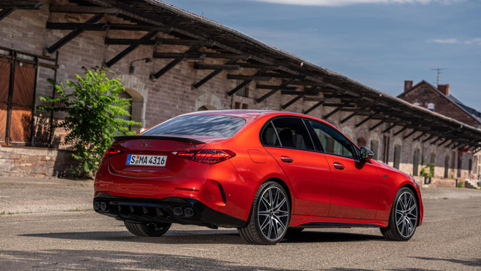 A distinctive rear diffuser, subtle decklid spoiler and quad round tailpipes considerably enhance the exterior of the model. - Credit: Mercedes-Benz AG