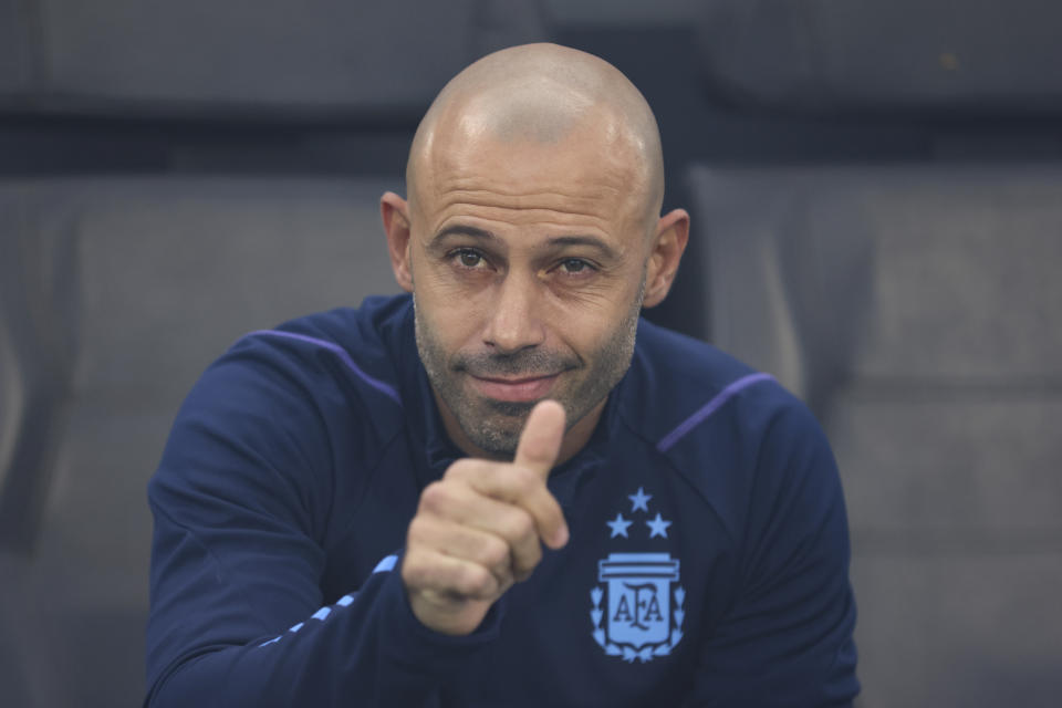 Argentina's coach Javier Mascherano gestures to photographers prior to a FIFA U-20 World Cup Group A soccer match against Uzbekistan at the Santiago del Estero Stadium in Santiago del Estero, Argentina, Saturday, May 20, 2023. (AP Photo/Nicolas Aguilera)