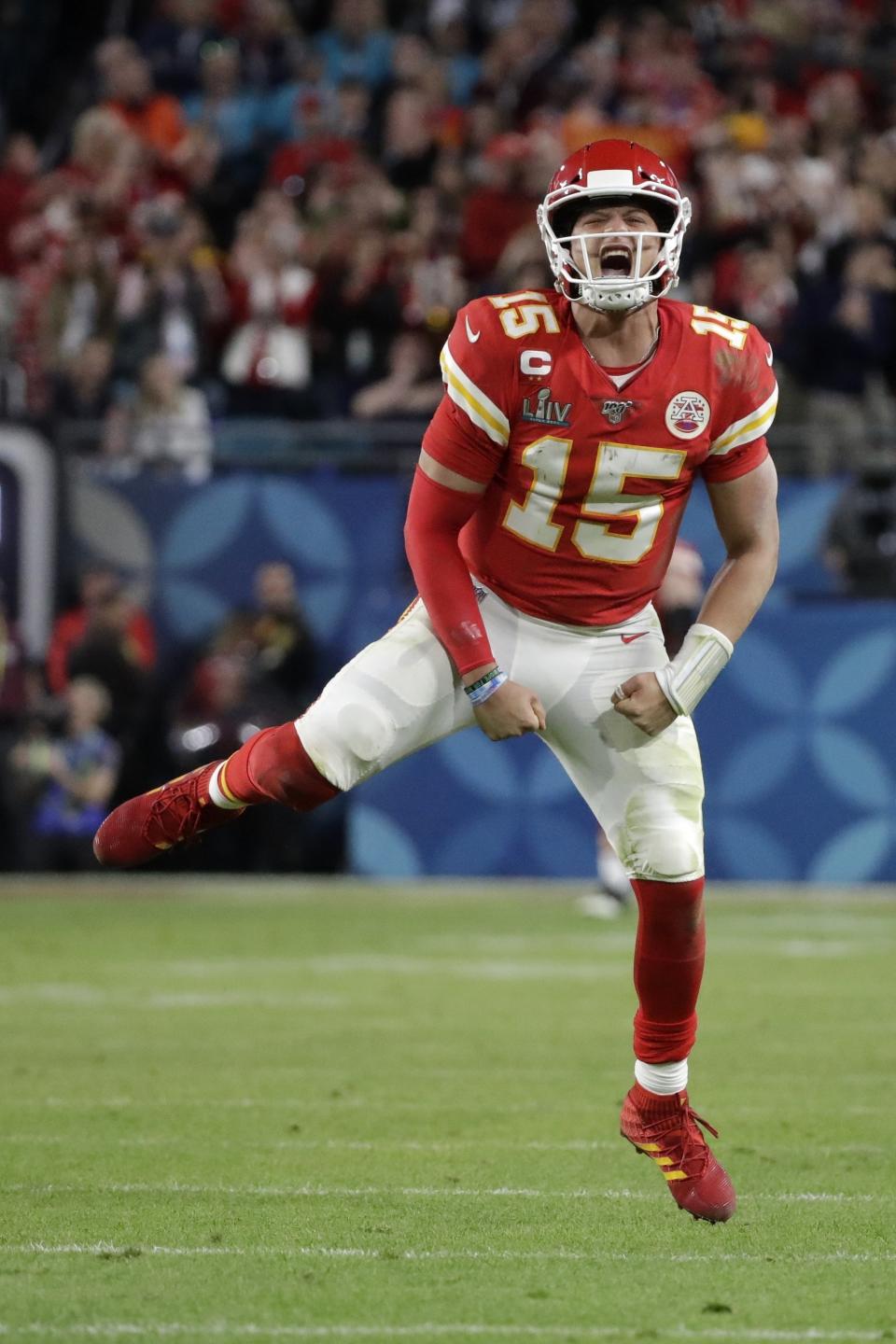 FILE - Kansas City Chiefs quarterback Patrick Mahomes (15) celebrates a long pass against the San Francisco 49ers during the second half of the NFL Super Bowl 54 football game Sunday, Feb. 2, 2020, in Miami Gardens, Fla. The success stories are the reason why teams keep coming back hoping to get their franchise-lifting quarterback success story like Patrick Mahomes, Josh Allen, Lamar Jackson or Joe Burrow. (AP Photo/Wilfredo Lee, File)